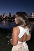 I love this top! The crop is the perfect length and the cutout in the back is so cute! The top fits true to size and is very flattering. I want one in every color! - Madeline R.