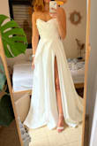I love the dress. It runs a little big but overall, it's more than I could wish for. I've been looking for a dress for a long time for my wedding and I'm glad to say I'm done. The fabric is pretty good and not cheap. The dress is really long so you can adjust to your needs. I really recommend it. - Mai R.