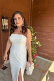 This dress is stunning! Very good quality, not see-through. The bow fastens securely and is a bit heavy but not uncomfortable. I wore it for my engagement party! Highly recommend! I'm about 136 lbs and a medium fit a bit snug but looked amazing! - Marianne S.