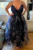 The amount of tulle on this dress is outrageous. It's extremely unflattering and extremely ugly. I never review items but had to save someone from this dress. - Ellen F.