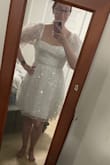 I bought this dress as a potential wedding reception dress. It does not look good on my hourglass body. I practiced dancing and jumping in it and the sleeves kept falling down which would definitely cause a wardrobe malfunction! :o - Jaclyn W.
