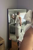 My fiancé and I are having a "courthouse wedding" two days before our actual reception and I didn't want to spend even more money on another dress so found this amazing dress on Lulus and was stunned how great it fit!

Wanted something very sleek but also cute for pictures and I did not want to spend $$$$ on another "wedding" dress! 

Absolutely perfect! - Amber T.