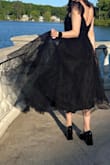 Absolutely love this dress! I wore it to a wedding. It has the flowy skirt of my dreams!! It runs just a tad bit big!! And you wanna pack a steamer for the under layer if you have to travel with it in a suitcase!! - Erica T.