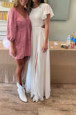 Wore this to my bridal shower. Many compliments! Honestly could be a wedding dress as well. Thick material, couldn't see undergarments. Im normally a small bit sized down to XS. - Rebekah Z.