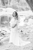 I loved the dress. I am short but I knew ordering a large dress would fit long. I just pinned it below my breast line and it fit fine. I was 8 months at the time of the photo shoot. It fit me perfectly. I loved the style. I also wore to the baby shower. I got a lot of compliments. - Jessell M.