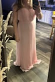 The zipper was broken and will not zip all the way up. The straps are very very thin. And the top half seems to have a lot of extra fabric on the sides. Making the top a little strange. Very long. - Shelby J.