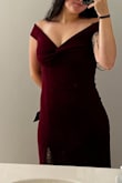 I wore this to my fiancés military ball and got a lot of compliments! The material is super nice for the price, it looks fantastic, the slit isn't too high for me, and the length of the dress was great. The color is exactly what was pictured - a lovely burgundy. It just looks a bit darker in the pictures cause of lighting. I was a little worried about the straps being too tight around my arms throughout the night but I had zero issues. I definitely love this dress! - Brooke A.