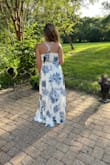 This dress fit great! It looks just like the picture and the material was good quality for a wedding or formal event! Because it's a wrap dress, it's easy to adjust to your waist size, and as a 32DDD that's always appreciated. There is a little clasp button in the bust to keep the neckline in place, which I don't usually like because with my bust there's usually not enough room and it pulls on the button, but it actually worked perfectly. The dress was a little long on me but with decent heels (~4in), or hemming the dress that would have been fine. I bought this for a mix-and-match bridesmaid dress (my assignment was white with blue floral). Unfortunately, I had to return the dress because the bride wanted true white, and this is definitely more off-white/cream. Lulu's team was great and made the return super easy. - Cathleen Y.
