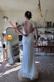 The dress fits great. A little big on the bust area but with some adjustments it fits perfect. The waist and overall fit fits great. I am excited to show it off. - Yaret B.