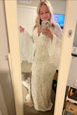 I actually bought another custom wedding dress first from a different site that was $400 and wasn't in love with it. I decided to order this dress but was nervous that it was too cheap for a wedding dress. I was wrong! I should've went with this dress to begin with! It is like boutique quality, and no one would have any idea it was under $200. The sleeves are beautiful. However, it is much longer than expected. It drags the floor on me quite a bit, but after some tailoring, it will be just fine. Also for the large chested girls, this is a great dress that is classy but still sexy. Just the right amount of cleavage. It is a very flattering fit, and it makes me feel so beautiful. Highly recommend!! - Brianna P.