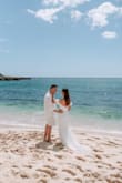 The fabric is thin but not see-through. It's perfect for a summer outdoor wedding. The design of the train, with great length, is a little bit fancy but not too much. - Claire B.