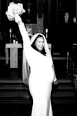 This dress saved me! I ordered this dress the week of my ceremony and paid for 1 day shipping. The dress arrived with a garment bag and it was stunning. I got married while being almost 35 weeks pregnant and this dress made me feel beautiful. It was easy to slip into. I ordered a 1x to accommodate my big belly. - Glennis P.