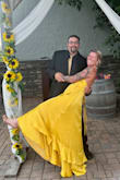 The dress was absolutely beautiful. The reviews were accurate that the front can open up slightly. You can easily make the dress snug when lacing it up. I did have a small stitch added and cups sewn into the gown. I received so many compliments on my dress. Definitely will be ordering again in the future - Nicole L.