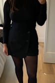 OK AMAZING!! This is so so so comfortable and flattering. It's a high-quality fabric that I have worn to work 3X already. We're having a heat wave, and I worked on video shoots and photographed a wedding in it. It's so perfect! It's a little funky how they are shorts on the back and a half skirt on the front, but it's kinda perfect because then people know [they're] shorts (especially for me at work bending down and all). It's so cute. I also see myself wearing it out with boots for sure. - Danielle D.