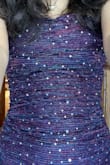 I haven't gone to the dance yet, but I've tried it on. Even though it's a bit tight around my thighs, it looks really good! The fabric looks really cool! My date is going to have a hard time matching it though... - Mia V.