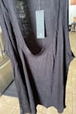 I was sent the complete wrong item and it will not let me return or exchange it for what I paid for. I was sent a basic black ribbed tank top. - Jaclyn W.
