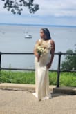 This dress fit beautifully. The material is very substantial and luxurious. This dress was also very comfortable. I had the straps taken up to bring up the neckline a bit. - Shani L.