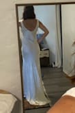 I kept seeing this dress and I knew I had to buy it eventually. After reading the reviews that said the dress ran big, I decided to order one size smaller than my usual. It fits me snug but not too tight. Only "downside" is the hem in the front is a little short, so it limits the heels I can wear with it (not a huge issue). I think the dress was designed to be loose fitting (the hem would fall better if I went with a small), but if your preference is a tighter fit then I would recommend sizing down like others suggested! Dress does need a good steam after unpacking.  

It's more than just "good for the price" it's amazing! Will be wearing it for my vineyard bridal shower in October with heeled cowgirl boots. - Ellon M.