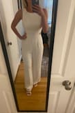 I was searching for a jumpsuit for my rehearsal. While this fits nicely as a small (originally ordered a medium but it ran big), it just didn't have the bridal look I was going for. It is a little plain but good if you are looking for something simple! - Michelle N.