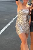 Such a fun dress! Very sparkly and surprisingly comfortable. I actually cut the straps off to make it strapless. - Stacey S.