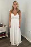 Got this for my vow renewal ceremony on a beach. The front of this one is a bit plain, but the back is sooo pretty. It is so comfortable and flattering. I got a large, and I would not need any alternations. - Sherri M.
