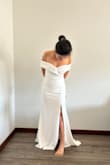 I loveeeee loveeeee this wedding dress I wore at my wedding ceremony. This dress gave me a simple yet elegant look which I love. It was quite long for me so I hemmed it down a bit. I am so satisfied with my purchase. Be careful though, if you are quite busty or want your front to be covered this might not be an option for you. For the shipment of this dress, it took only 10 days (which is fas) considering I am from a small town in Australia). I reckon Lulus is from the US! Thank you, Lulus! - Katherine G.