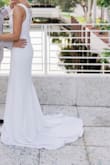I bought this dress and absolutely loved it. It was a little too long but it worked out just fine with high heels. - Emma R.