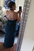 I bought this dress for an engagement photo shoot. The color and fabric are beautiful! I think it is made for a longer torso than mine though. Great dress! - Rosanna H.