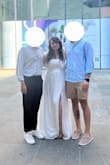 I wore this dress to my civil ceremony and felt very comfortable and pretty in it. I should have gotten it hemmed because I'm 5'2", and it was too long, even in my tallest heels. I have a 32G bust and was pleasantly surprised that the dress fit over them. The quality is very nice, and I highly recommend this dress :) - Eve F.