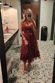 This dress is beautiful! Also very comfortable. I received soo many compliments all night. My only suggestion is to make sure someone is there to help tie the corset for you.
My only complaint is 10 minutes before leaving for the wedding, my one strap broke. I think it was fixable but I could not get it to loop through the clip for the life of me. I ended up tucking in the one strap so it looked strapless on one side and the dress still stayed put. I almost liked it better this way! - Kaitlyn L.