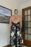This is a gorgeous, lined, quality material dress! True to size, I got a large and I'm normally a 10/12.. perfect for a fall wedding in this black color, with a pop of pretty flowers! (Ignore my blue scrunchie!) - Elizabeth P.