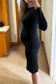 This dress was perfect for a wedding I attended. The midi length and covered front are classy but the open back makes the dress sexy & makes a statement. It fits snugly, but there is also enough room to allow for a pregnant belly lol. - Megan B.