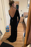 Fits like a glove, it's stretchy and so beautiful! Such a gorgeous gown! - Jessica R.