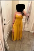 I got so many compliments on the dress and colour. It's beautiful but a bit heavy with the material. I was fine for a spring wedding with 20 C weather. BUT if you're a curvy/hourglass girl, buy the size to your WAIST. I'm usually a medium in tops and large bottoms (size 10-12 jeans) and I wish I bought the medium. I didn't have enough time for a return and had to bring it in lots at the waist. There's so much room for your hips so don't worry about that. First is how I got it. The second picture is after it got taken in. - Kaitlyn M.