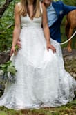 Loved the lace on this, beautiful quality details but no big gaudy flowers. It was too princess for me, so I removed the tulle layer entirely and just pinned back the lace layer a bit (got it 2 weeks before our event so no time for professional modifications). Nice contrast between the tight top and flowy bottom. Everyone loved it! - Zannah P.