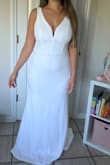 This dress is amazing! Fits perfectly. I felt like I looked skinny with it, [and] I have a 9 month old baby. - Isabel R.