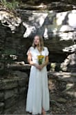 Very happy with this dress for the price. Worn as my wedding dress. Hiked 1.5 mi uphill and back out in it, and it was great for that purpose, with the split in the front. Had it taken in slightly in the waist to avoid sagging in the "waistband", but it fit fine without alterations. I simply preferred a more "precise" fit for the occasion. Alternations may not be necessary for all! - Chloe W.