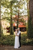 This was my wedding dress & I absolutely loved it - the style is very "me" and I loved the way it looked on my body. The top fit perfectly - it's a stretchy material so it has a lot of give. However the skirt was tight, I was able to get it on/zipped/buttoned but it was a struggle & snugger than I would have liked it. - Dana R.