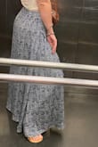 Easy piece to dress up.  Probably could've ordered an XS, but the S was perfect for vaca, not super night walking around at night, and sat just above my hips instead of at the natural waist.  So much movement and the slit is perfect. - Brittney K.
