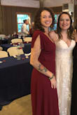 There's a snap at the front and ties around the sides. I felt secure in it; although, when a big gust of wind came through, I almost flashed my friends. I really like the sleeves. I felt beautiful in this dress. - Jordan W.