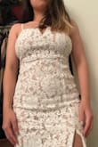 The dress looks good. I'm in between sizes xsmall and small. I decided to go with a small, and it's a little bit loose. The worst thing is the zipper doesn't work properly. It gets stuck easily and feels cheap and flimsy. - My N.