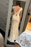Purchased for elopement. I will have some alterations done to add cups, hem, and maybe a few fit tweaks if possible; but the fit right out of the box is incredible! So elegant, simple, and comfortable. - Amy R.