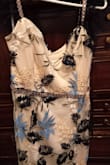 This dress is gorgeous.  The photos do not show the beautiful detail. The stunning beading and wonderful embroidery are breathtaking.  I highly recommend buying this dress. - Aleesha K.