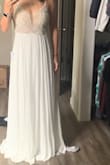 Got this as a backup dress since I wasn't sure my other dress would be done with alterations in time. I wish I'd found it first cause I like it more, and it was way cheaper (the other dress was $1000 before alterations)! My other dress ended up turning out fine so I ultimately returned, but I would have been equally happy with this one! Looks better in person - Kelly S.