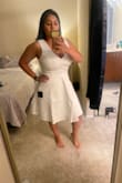 I loved the dress and the fit. I needed my fiancé to zip me up from behind. It hugs everything nicely and fits true to size. I got a large (although I am losing weight and re-ordered it in medium). Unfortunately, I could not enjoy the dress as it had multiple stains on the torso area. I ended up returning and re-ordering it. - Mindy M.