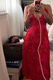 This dress is gorgeous. Love the side slip, the deep V, and the crisscross open back. The color is beautiful. - Dennise