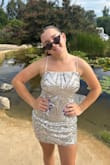 I love love loved this dress! I got so many compliments and it shaped my body so well! it was a bit loose but I wouldn't change anything about it! it goes with everything also!! - Drew B.