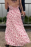 This dress worked out great! I got an XS because people said it runs large and it fits very well and tightens! - Francis B.