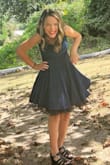 I bought this in XS for my 10 year old for homecoming. As soon as I opened the package, I let her know that she would not get to keep it afterward because it is now mine. Lol. The color of this dress is so dreamy. I don't even write reviews like this, for real, but I had to let everyone know. (paired with a black petticoat) - Kelly D.