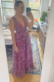 I was obsessed with this dress. I loved the colors and material, and I just felt so cool in it. Sadly, I only needed one dress, and there was another that was a little more practical and simple. I wasn't sure if the poofiness and vibrant pattern would be too much for the wedding I was attending. My friends/fam didn't love the cut on me but to each their own. Sadly, I did not keep it, but if you are on the fence, order it!! So fun!! Hopefully, this pic helps you see the color better. It does not look like the pic, but I actually like it better anyway. I also liked how tight and secure it was on my smaller chest, but if you're larger than a B cup, you may need to size up - Katie G.